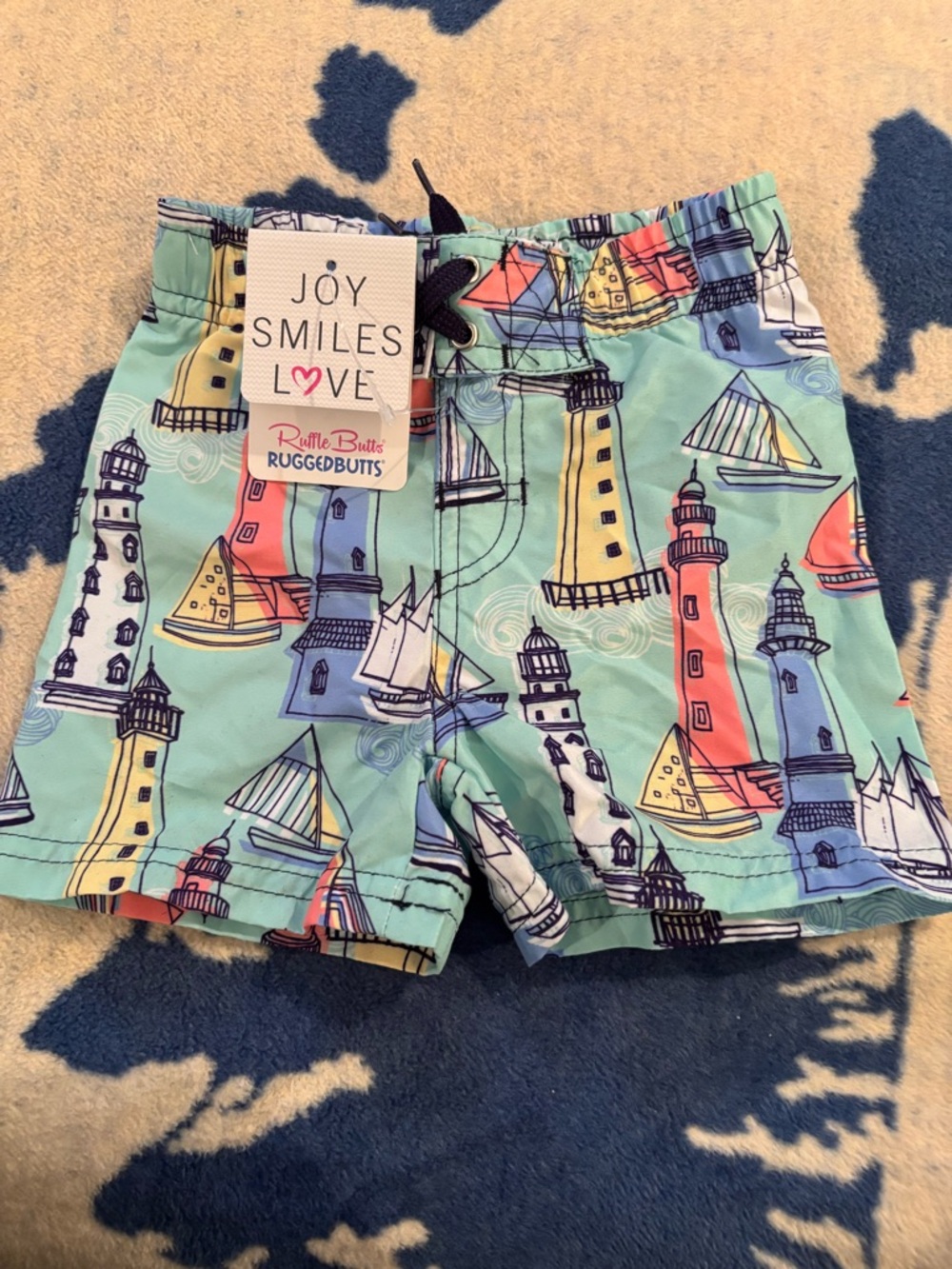 RuffleButts RuggedButts Aqua Lighthouse Swim Trunks for Kids